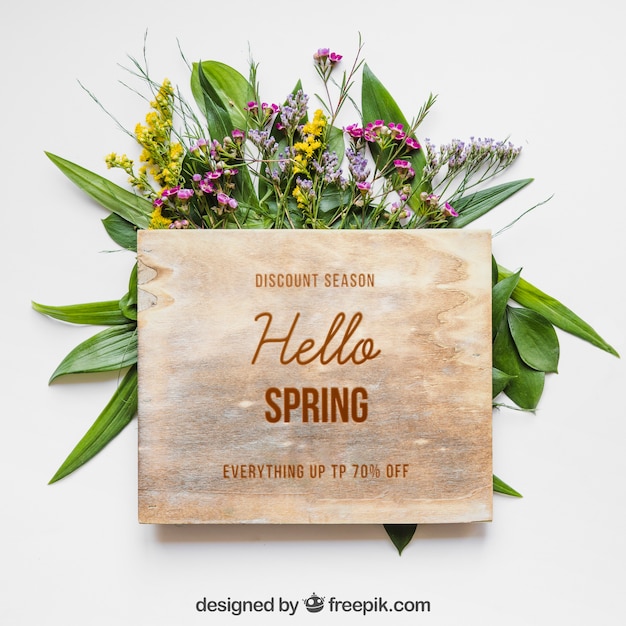 PSD mockup di primavera con tavola di legno