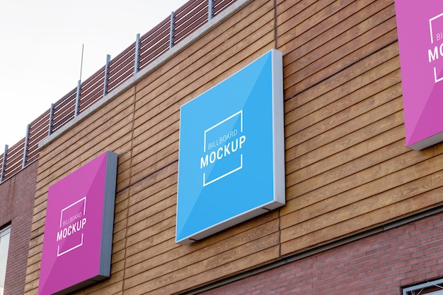 square billboards mockup on building wall