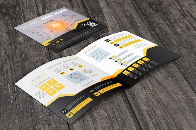 PSD square brochure mockup on wooden surface