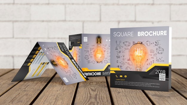 Square brochure mockup on wooden surface