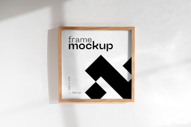 square frame mockup on a white wall