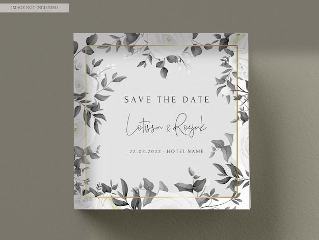 A square frame with leaves and the word save the date on it.