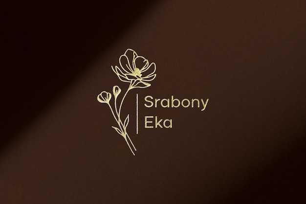 금색의 Srabony Eka 꽃 로고