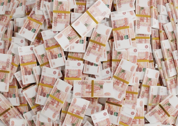 Stack russian cash or banknotes of 5000 russia rubles scattered on a white background isolated psd