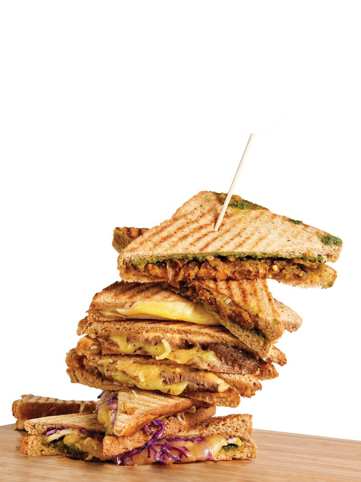PSD a stack of sandwiches with a toothpick sticking out of them