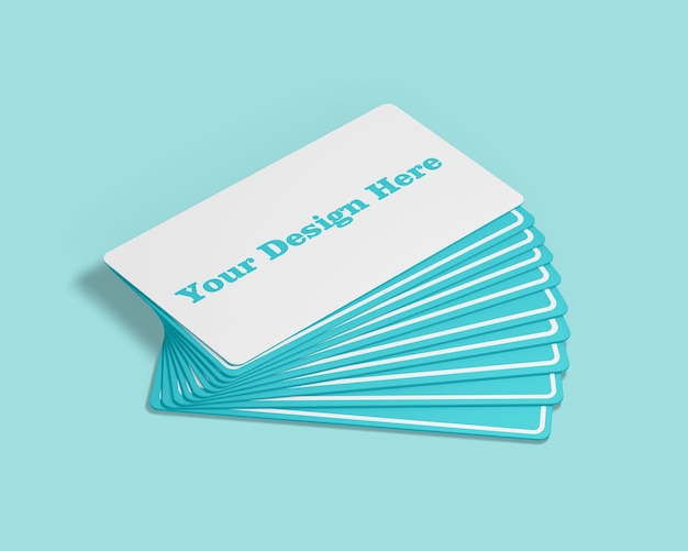 A stack of white business cards with blue text that says your design here.