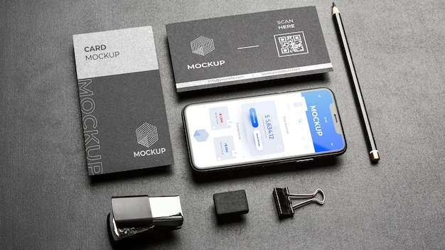 stationery mock-up on dark concrete