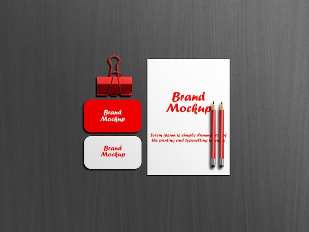 Stationery mockup with paper clips and pencil