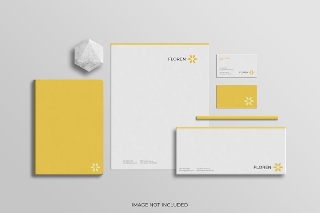 Stationery mockup with a paperweight