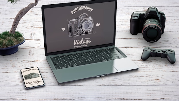 Mockup di cancelleria con concept e dispositivi fotografici