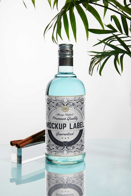 PSD still life of gin bottle with label mockup