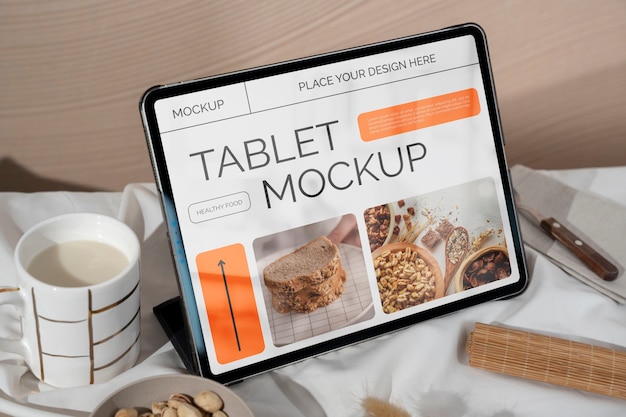 PSD still life of tablet mockup on table