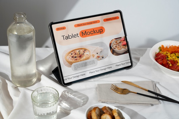 PSD still life of tablet mockup on table