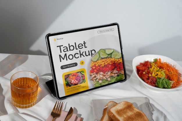 Still life of tablet mockup on table