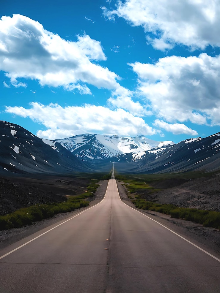 PSD straight road leading into the mountainous horizon