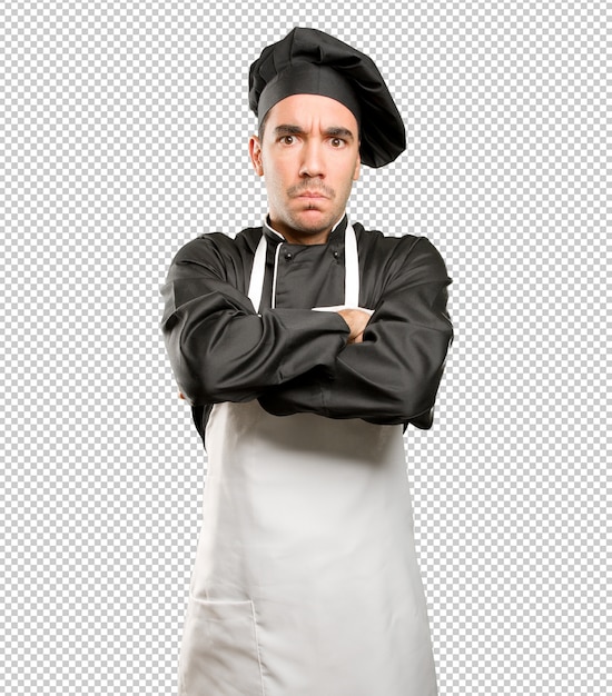 PSD stressed young chef posing