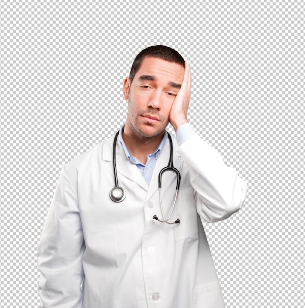 Stressed young doctor with a gesture of ansiety