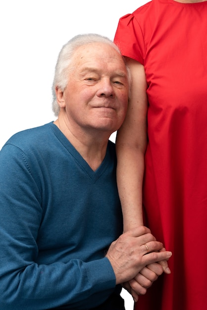 PSD studio portrait of loving elderly couple