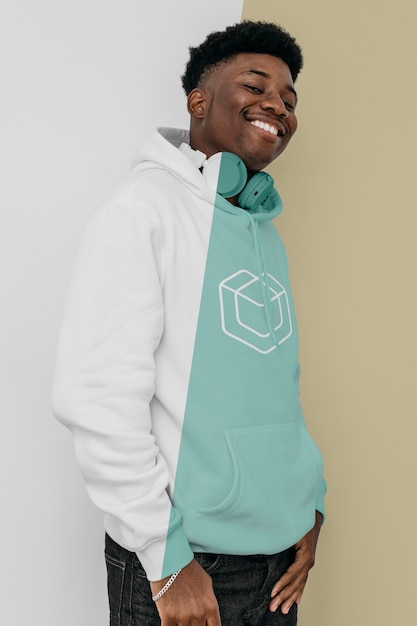 stylish man in hoodie with headphones