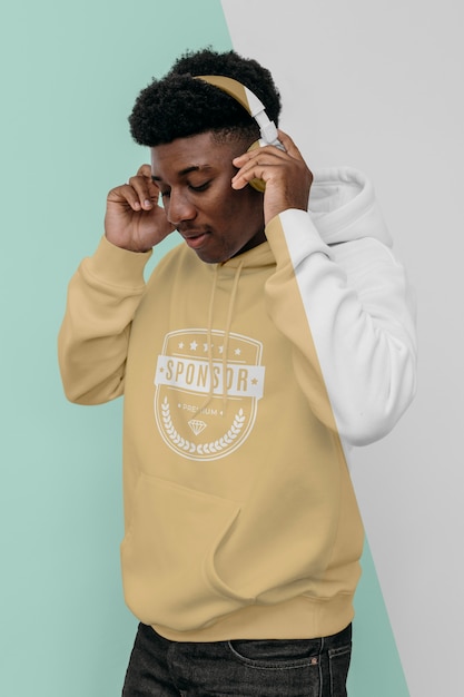 stylish man in hoodie with headphones