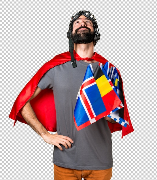 PSD superhero with a lot of flags looking up