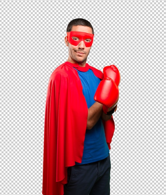 Surprised superhero with a boxing gloves