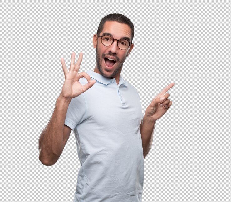 PSD surprised young man with a gesture of all right and pointing with his finger