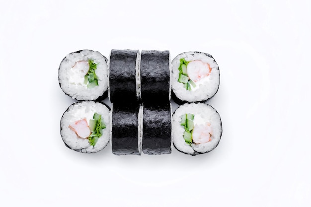a sushi set with a shrimp on top