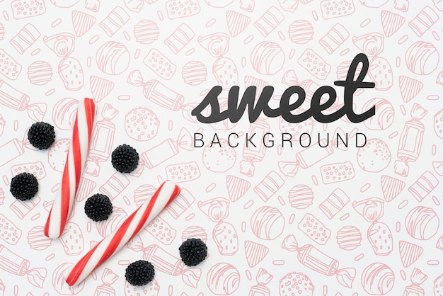 Sweet background with candies and berries