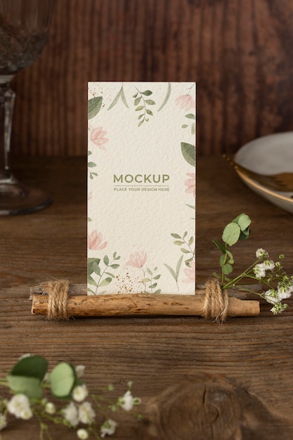 PSD table display mock-up with floral paper card