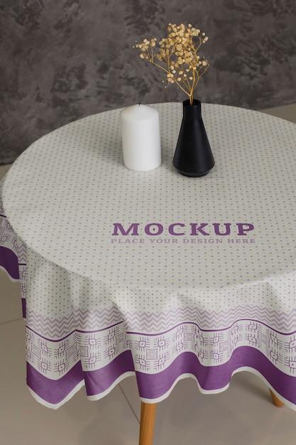 PSD tablecloth mock-up design on table indoors