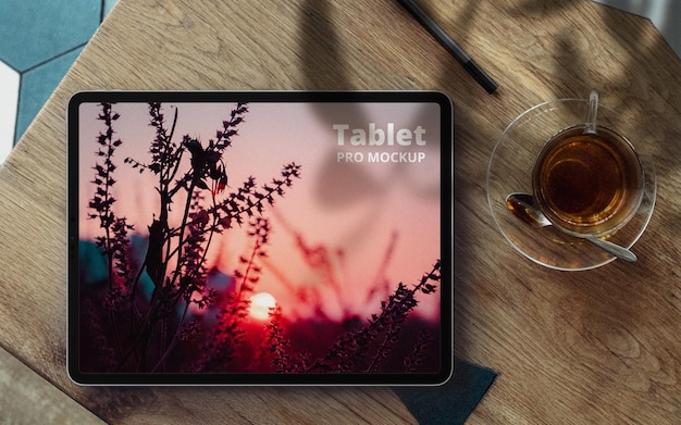 PSD tablet in desk mockup scene