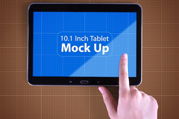 Tablet and hand mockup