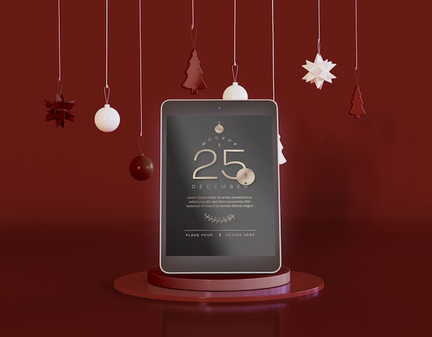 Tablet mockup con decorazioni natalizie