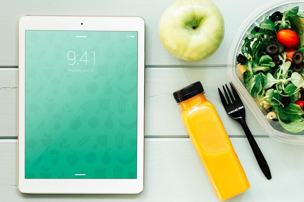 Tablet mockup with healthy food