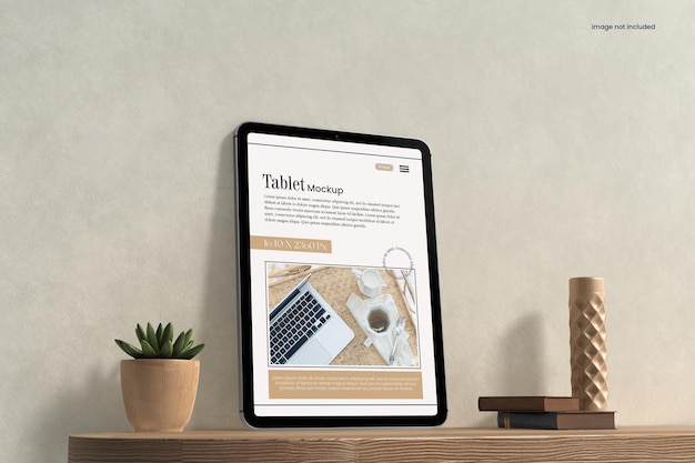 PSD tablet mockup on the wooden table