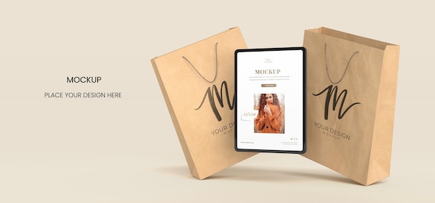 Tablet and paper bags arrangement mockup