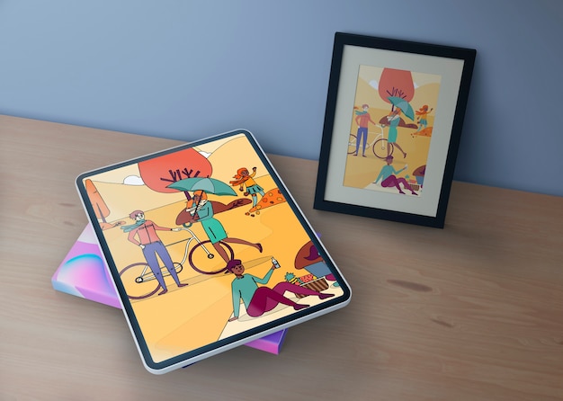 tablet and picture with colorful draw