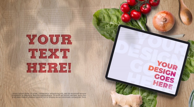 PSD tablet surrounded with organic vegetables mockup