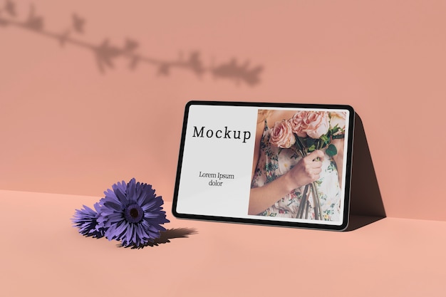 Tablet with photo and flowers