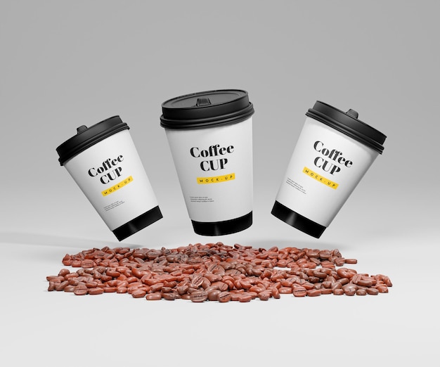 Prendete via tre tazze di caffè e fagioli di caffè mockup psd