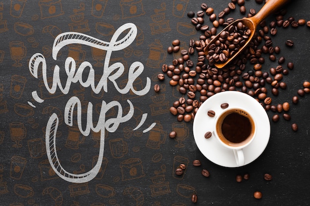 PSD tasty cup of coffee and coffee beans background