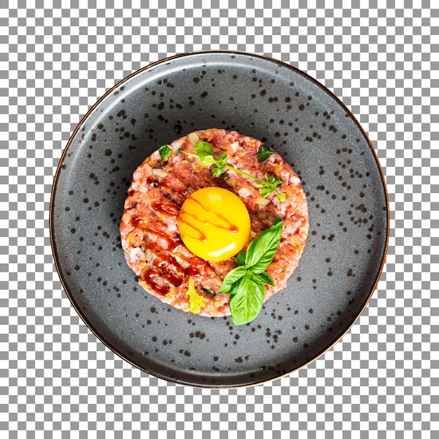 Tasty tar tar beef with raw yolk on plate with transparent background