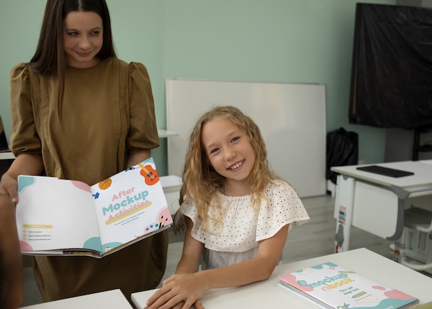 Teacher and students using stationery mockup