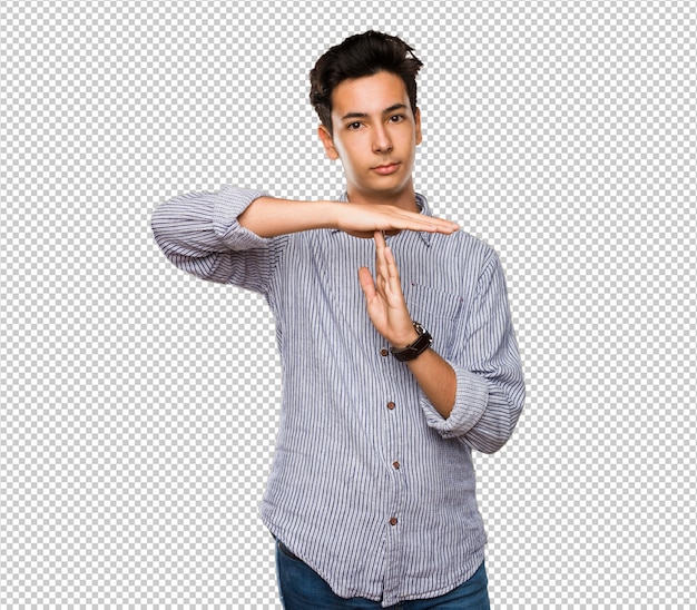 Teenager doing time break gesture