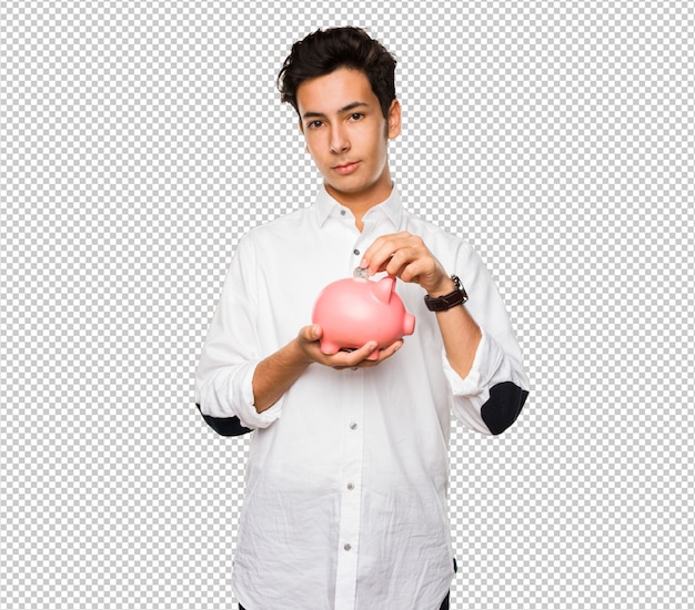 teenager holding a piggy bank