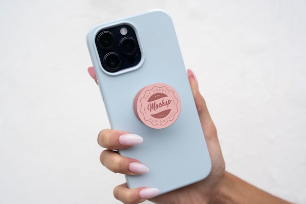 PSD telefoon met pop-socket mockup-ontwerp