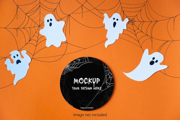 Template for halloween with decorative cute ghosts on orange background. black circle layout. mock up