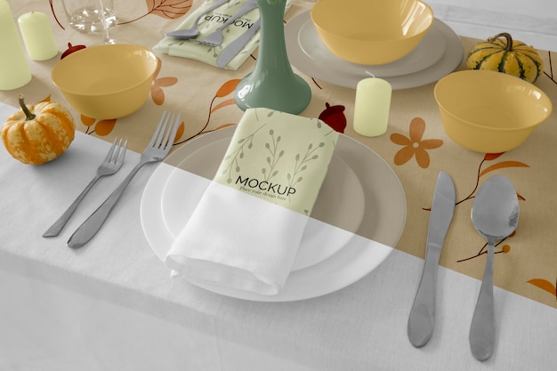 PSD thanksgiving dinner table arrangement with napkin on plate and cutlery