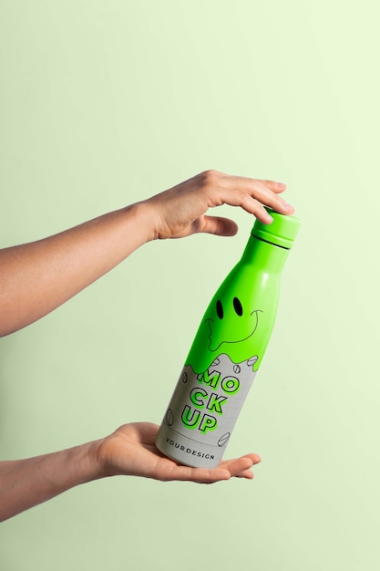 Thermo bottle mockup held in hand